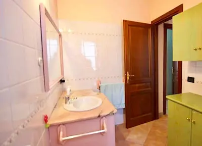 Bagno di Iss Travel- Casa Pustinu, 2 bedroom-apartment with air conditioning and private garden