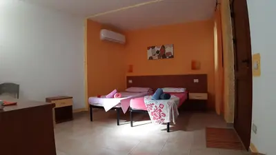 Letto o letti in una camera di Guesthouse Affittacamere Goloritzè