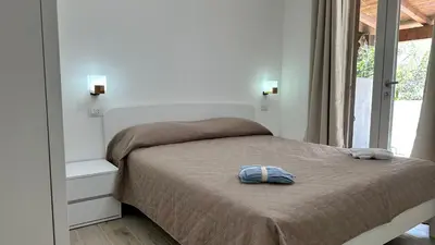 Letto o letti in una camera di Casa Dario