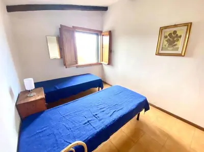 Letto o letti in una camera di Villino Ambra 2