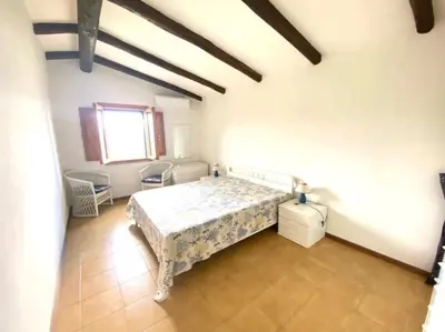 Letto o letti in una camera di Villino Ambra 2