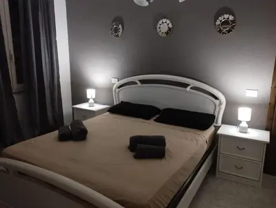 Letto o letti in una camera di Luna Apartment- Fronte Mare