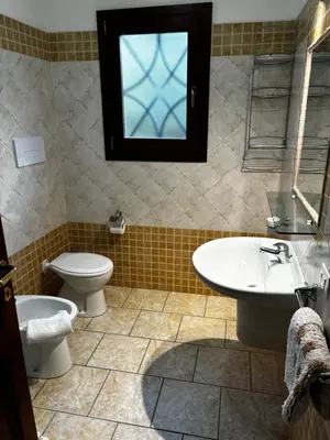 Bagno di Appartamento vista Mare Tanaunella