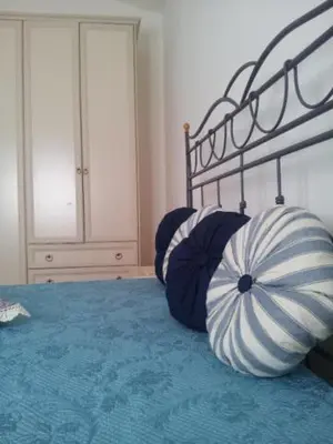 Letto o letti in una camera di B1 Lu Maestrali 1Piano