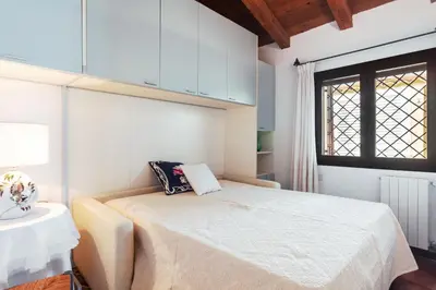 Letto o letti in una camera di Villa caposchiera a 150m dal mare