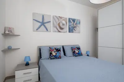 Letto o letti in una camera di Casa Marisa by Wonderful Italy