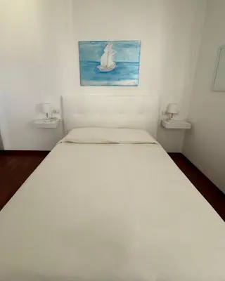 Letto o letti in una camera di Marco’s Home