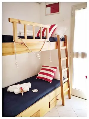 Letto o letti in una camera di Le case dei Venti