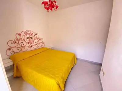 Letto o letti in una camera di Campania 1