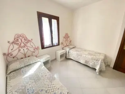 Letto o letti in una camera di Campania 1