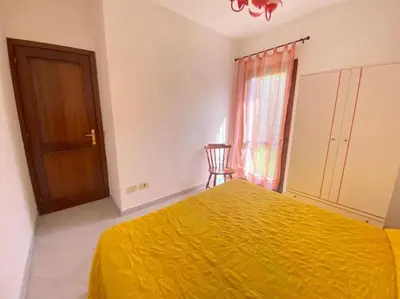 Letto o letti in una camera di Campania 1