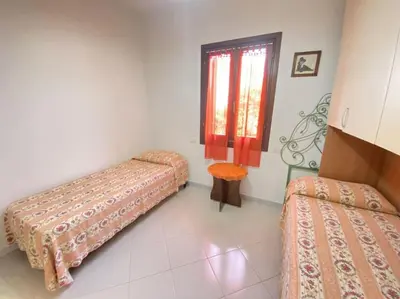 Letto o letti in una camera di Campania 4