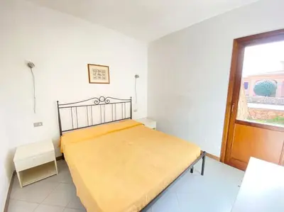 Letto o letti in una camera di Cinta 1
