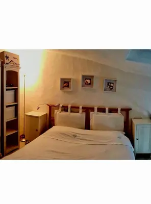 Letto o letti in una camera di Casa Poseidon San Teodoro