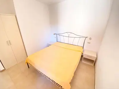 Letto o letti in una camera di Cinta 3