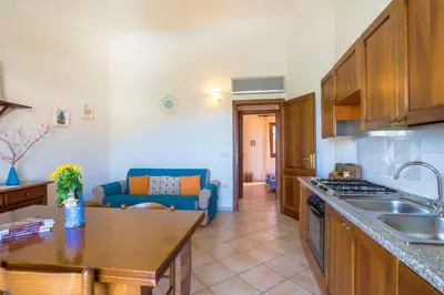 Cucina o angolo cottura di Sun and Sea LT - Piscina Condominiale - PMS CaseVacanze