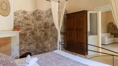 Letto o letti in una camera di Villa Il Casale Onifai