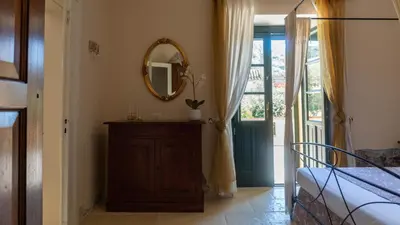 Letto o letti in una camera di Villa Il Casale Onifai