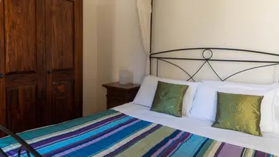 Letto o letti in una camera di Villa Il Casale Onifai