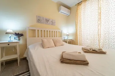 Letto o letti in una camera di Domo Papiros B&B