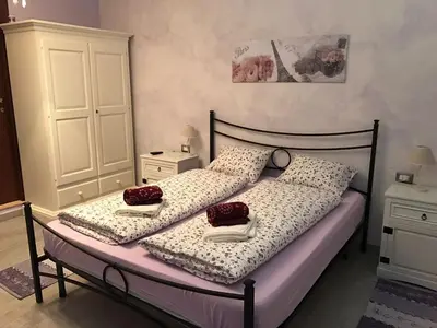 Letto o letti in una camera di Domo Papiros B&B