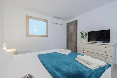 Letto o letti in una camera di Sea View House 5