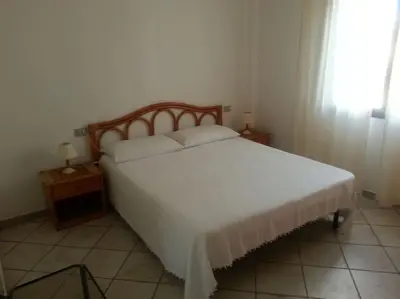 Letto o letti in una camera di F4 Sa Pedra Romantica 1Piano