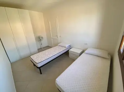 Letto o letti in una camera di Villetta Panarea 2 Livelli