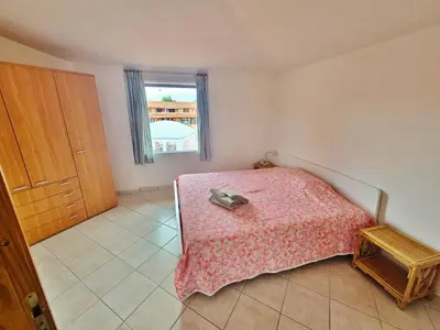 Letto o letti in una camera di A/C, sea view, 400 from the beach