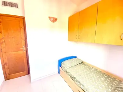 Letto o letti in una camera di Appartamento Lucca 2