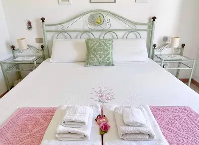 Letto o letti in una camera di Camera Ponente