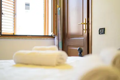 Letto o letti in una camera di La Caletta 1