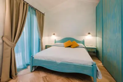 Letto o letti in una camera di Sherden Villa - Your House in Sardinia