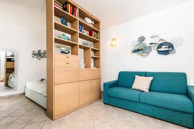 Area soggiorno di Mono Le Vele 700m From The Beach - Happy Rentals