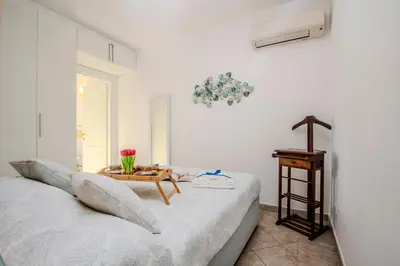 Letto o letti in una camera di Mono Le Vele 700m From The Beach - Happy Rentals