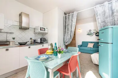 Cucina o angolo cottura di Mono Le Vele 700m From The Beach - Happy Rentals