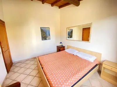 Letto o letti in una camera di Liguria 2