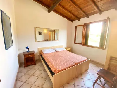 Letto o letti in una camera di Liguria 2