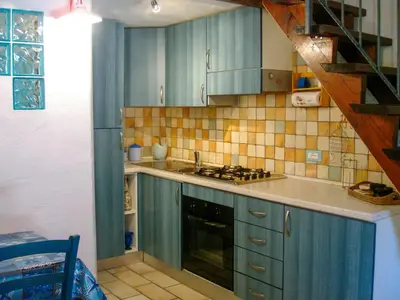 Cucina o angolo cottura di La Casa di Giacomo e Graziella Villaggio Tamerici