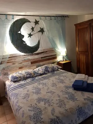 Letto o letti in una camera di La Casa di Giacomo e Graziella Villaggio Tamerici