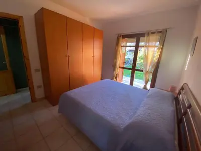 Letto o letti in una camera di Villetta a schiera 750m SPIAGGIA 600m CENTRO