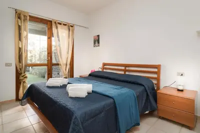 Letto o letti in una camera di Villetta a schiera 750m SPIAGGIA 600m CENTRO