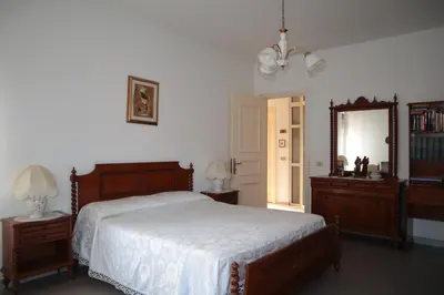 Letto o letti in una camera di Appartamento Via Oristano
