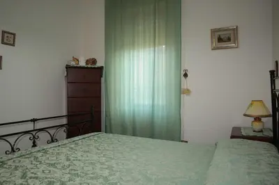 Letto o letti in una camera di Appartamento Via Oristano