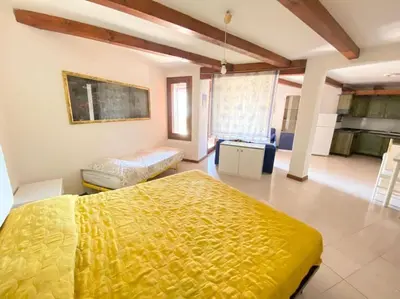 Letto o letti in una camera di Capo Coda Cavallo vista mare
