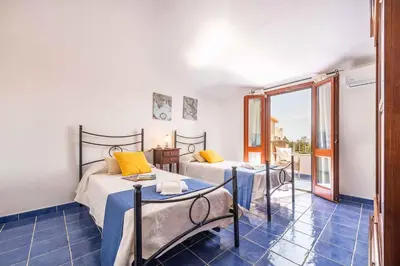 Letto o letti in una camera di Apartment in Cala Gonone - Nuoro (Provinz) 22965