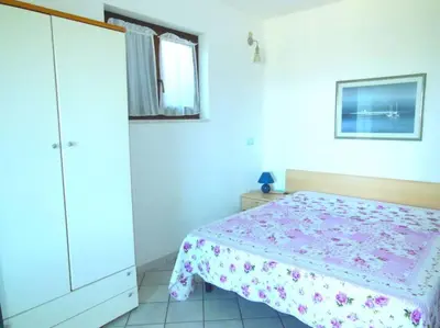 Letto o letti in una camera di Mono Citai