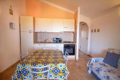 Cucina o angolo cottura di [Olbia 15 minutes] Enchanting sea view