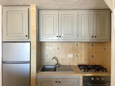 Cucina o angolo cottura di Punta Est Trilocale Splendida Vista Mare