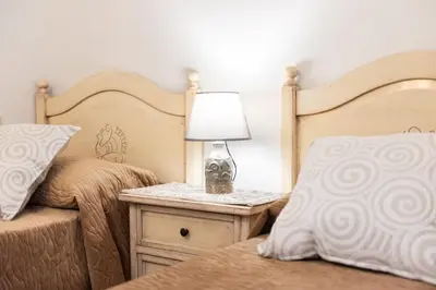 Letto o letti in una camera di Villa Barastula, confort e relax